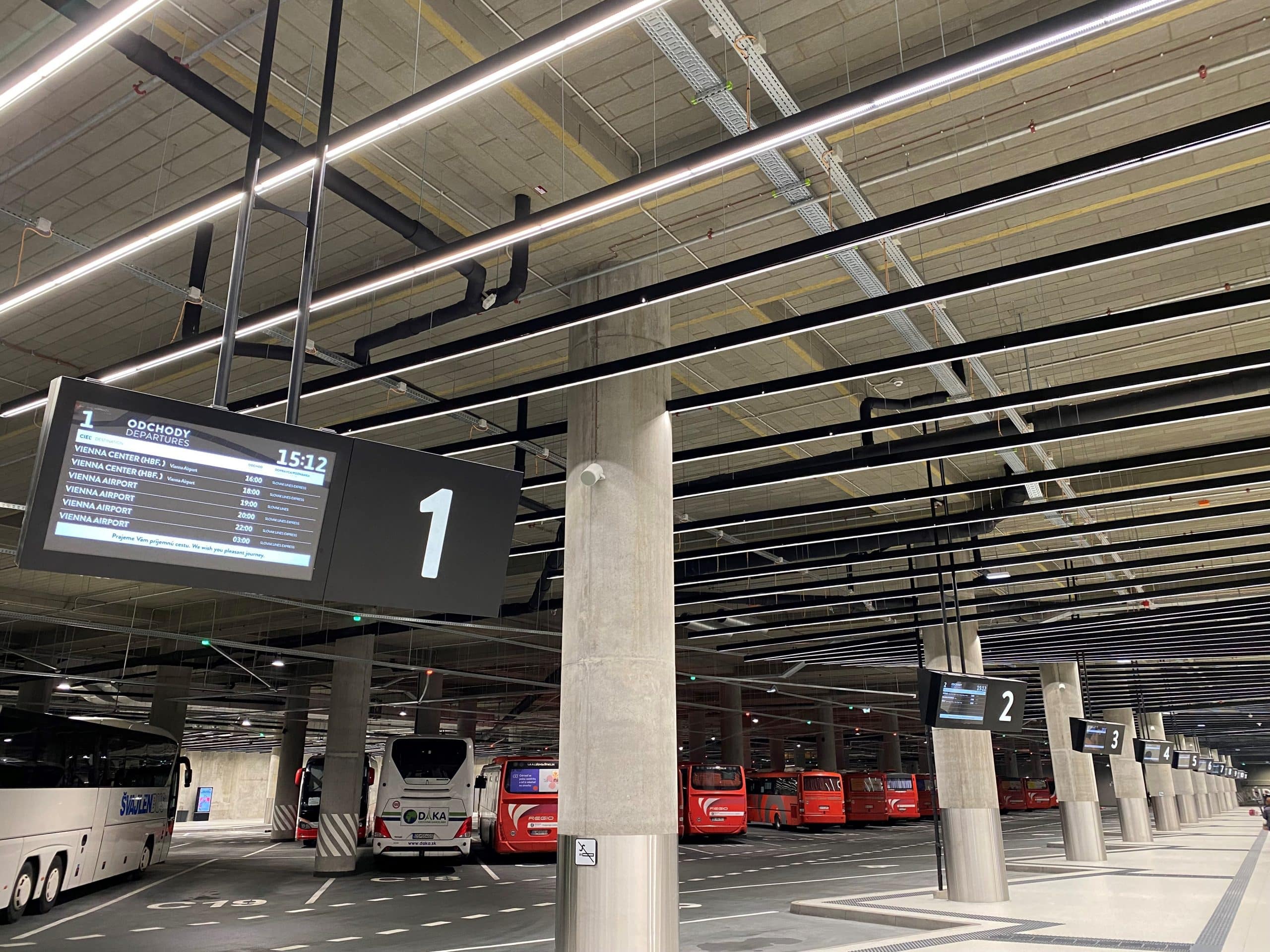 Displays on platforms showing real-time departure/arrival times